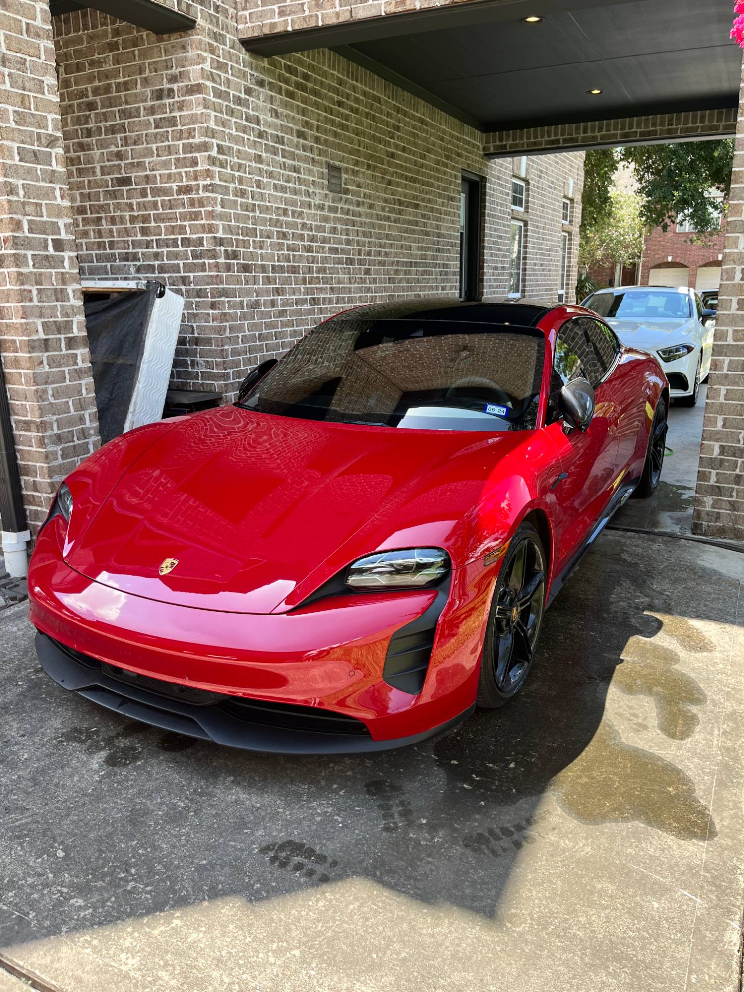 Full detail — Red Porsche Taycan showroom finish